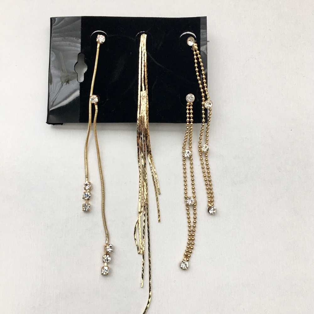NWT set of 3 pairs of gold colored dangle earrings